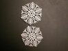 Snowflake Earrings 2 3d printed Printed with a different design, same material.